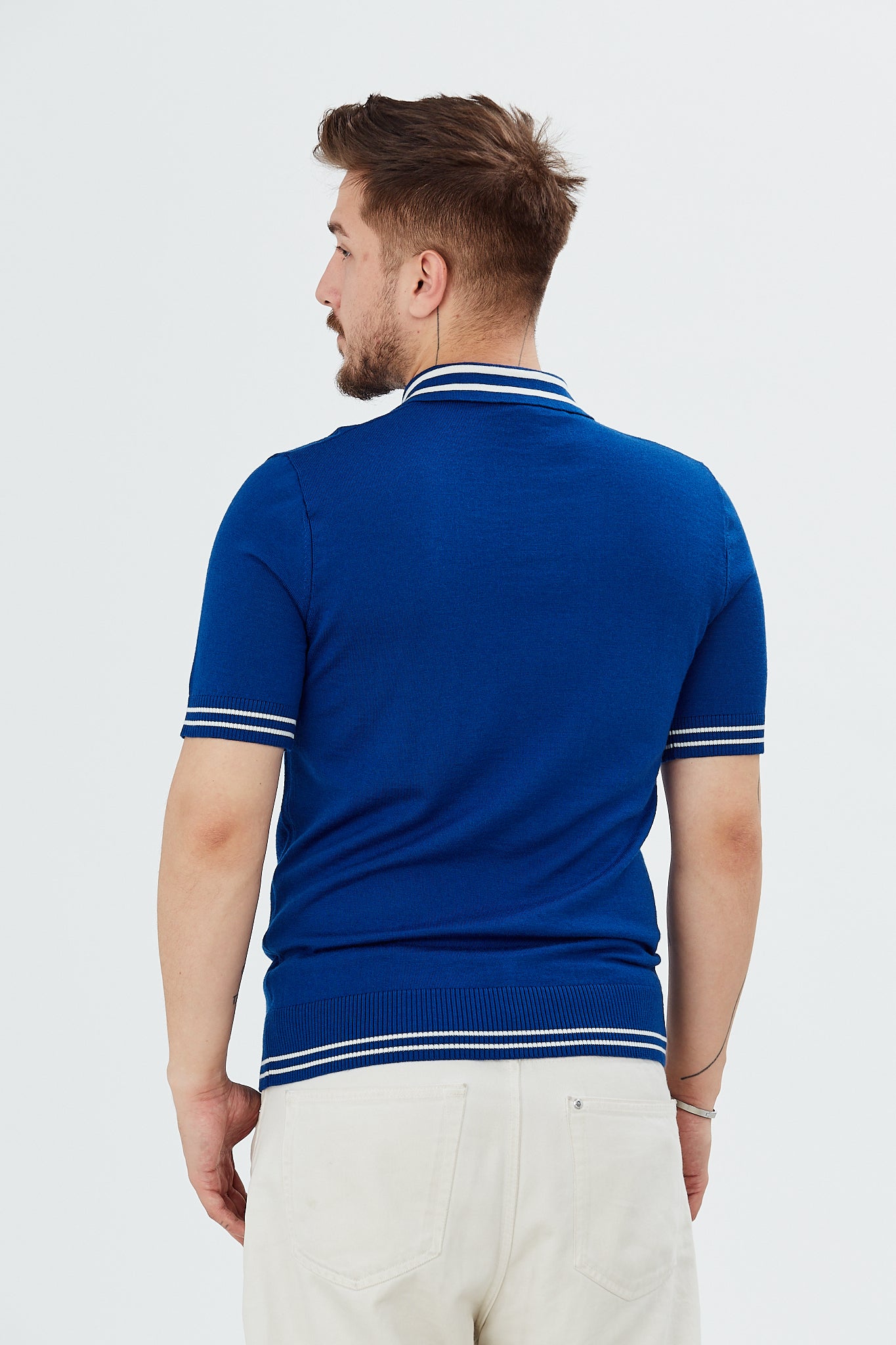 Sweater with polo collar and zig-zag patterns