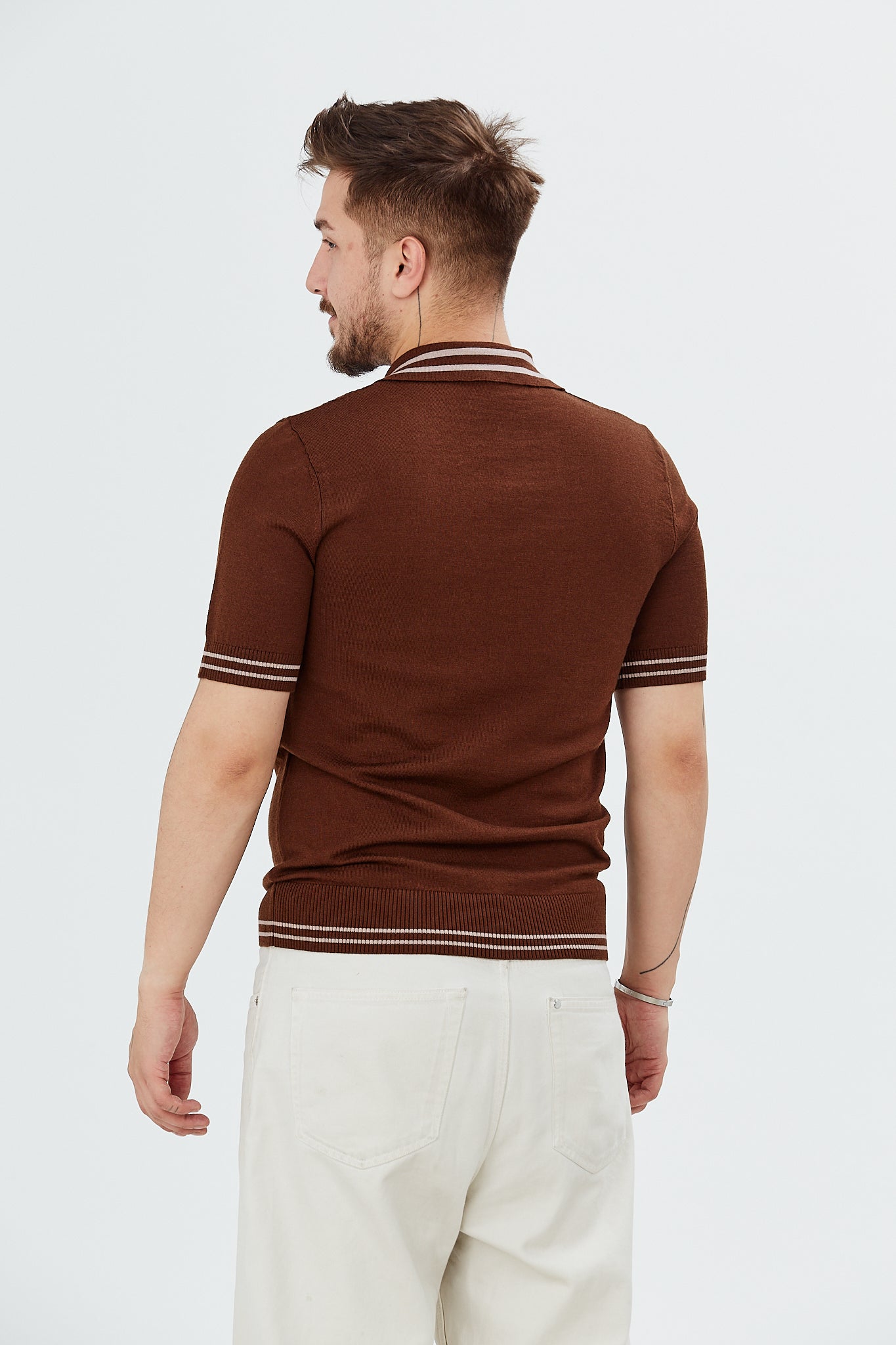 Sweater with polo collar and zig-zag patterns