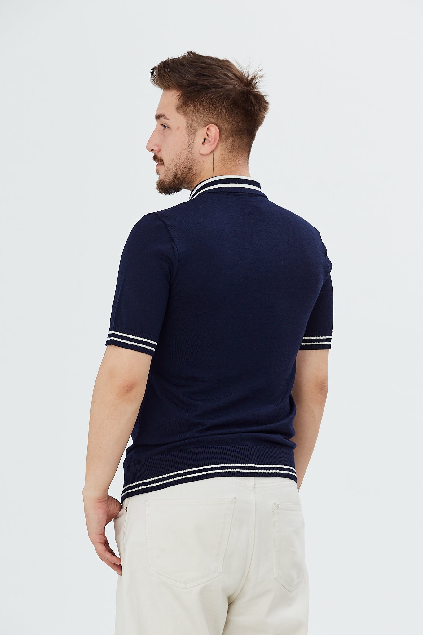 Sweater with polo collar and zig-zag patterns
