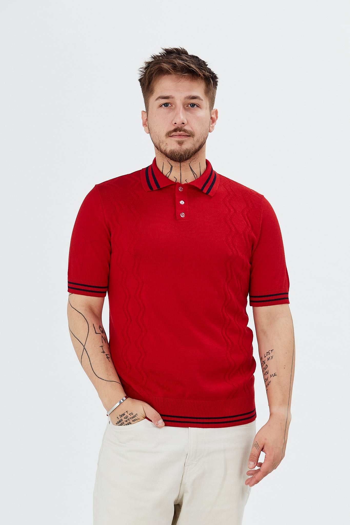 Sweater with polo collar and zig-zag patterns