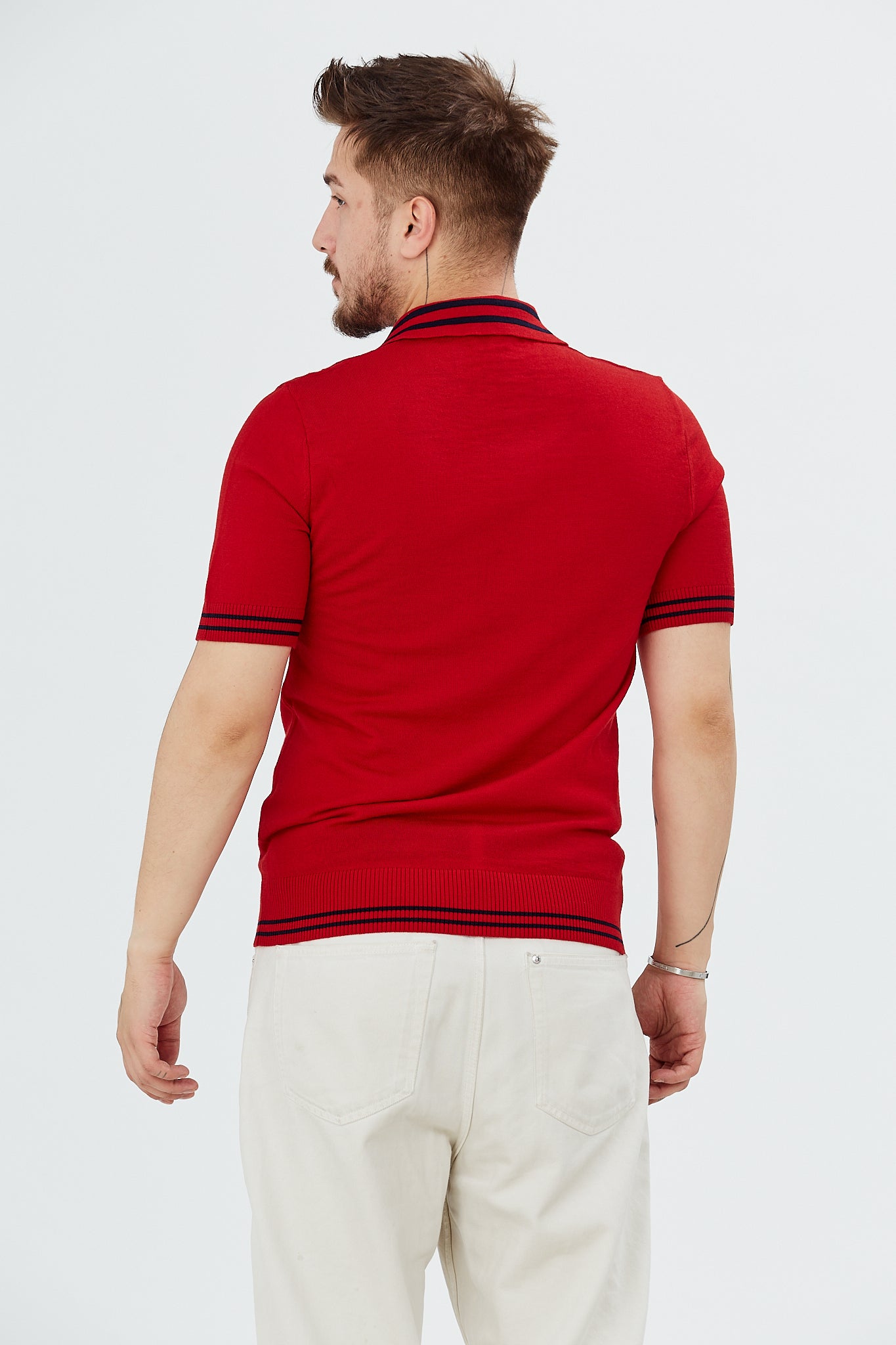 Sweater with polo collar and zig-zag patterns