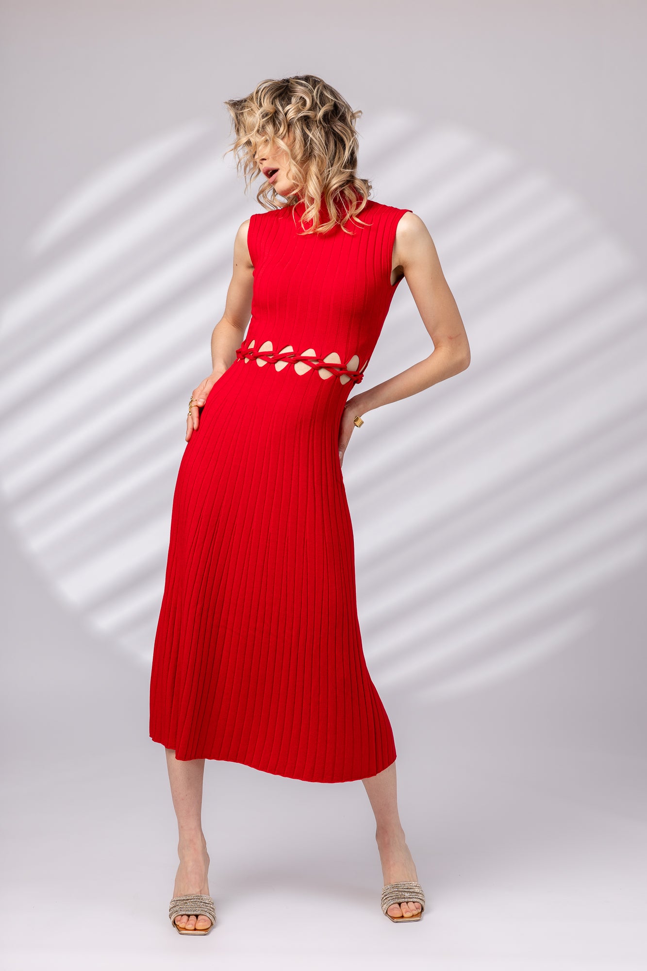Dress with braid at the waist