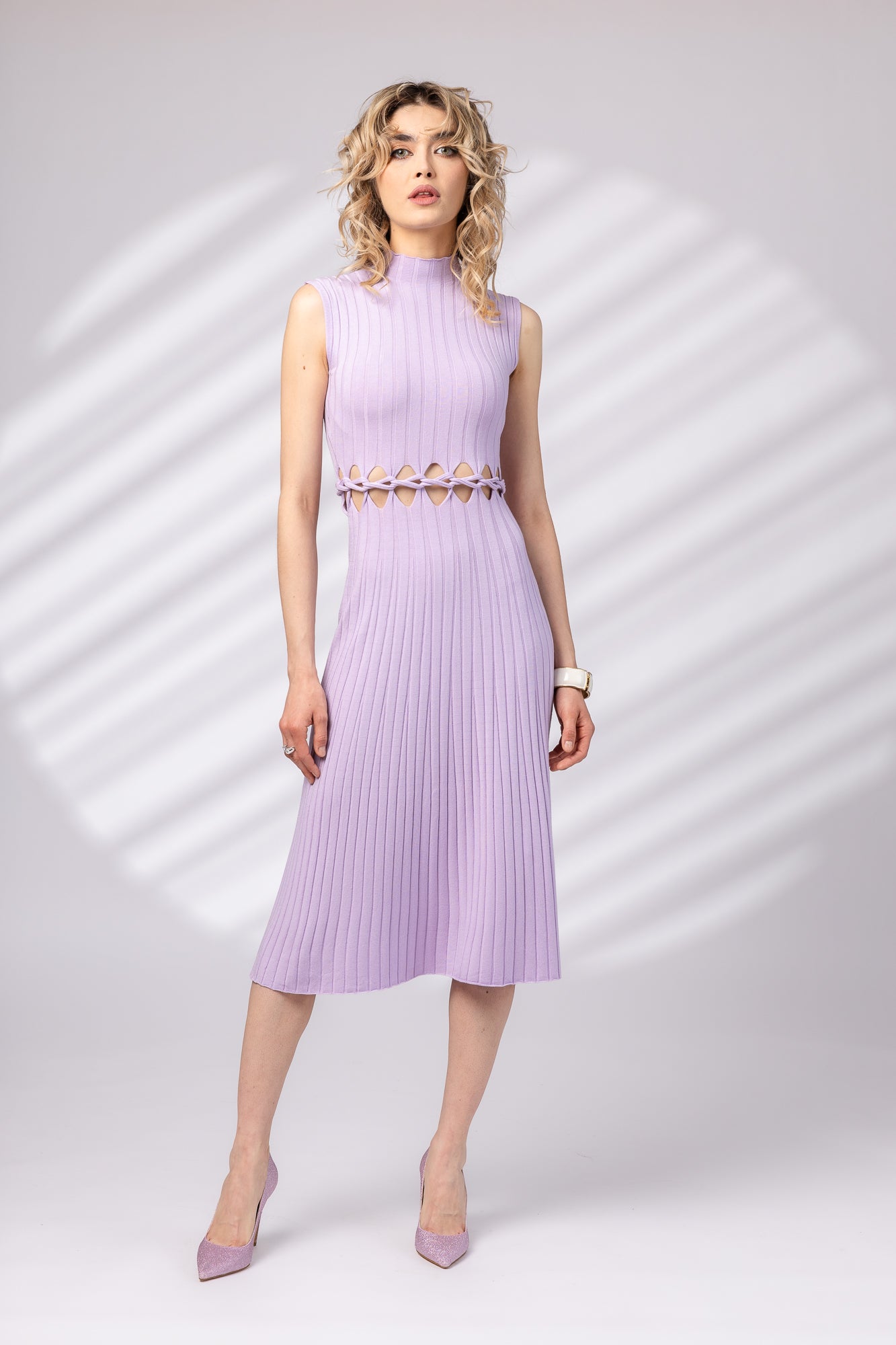 Dress with braid at the waist