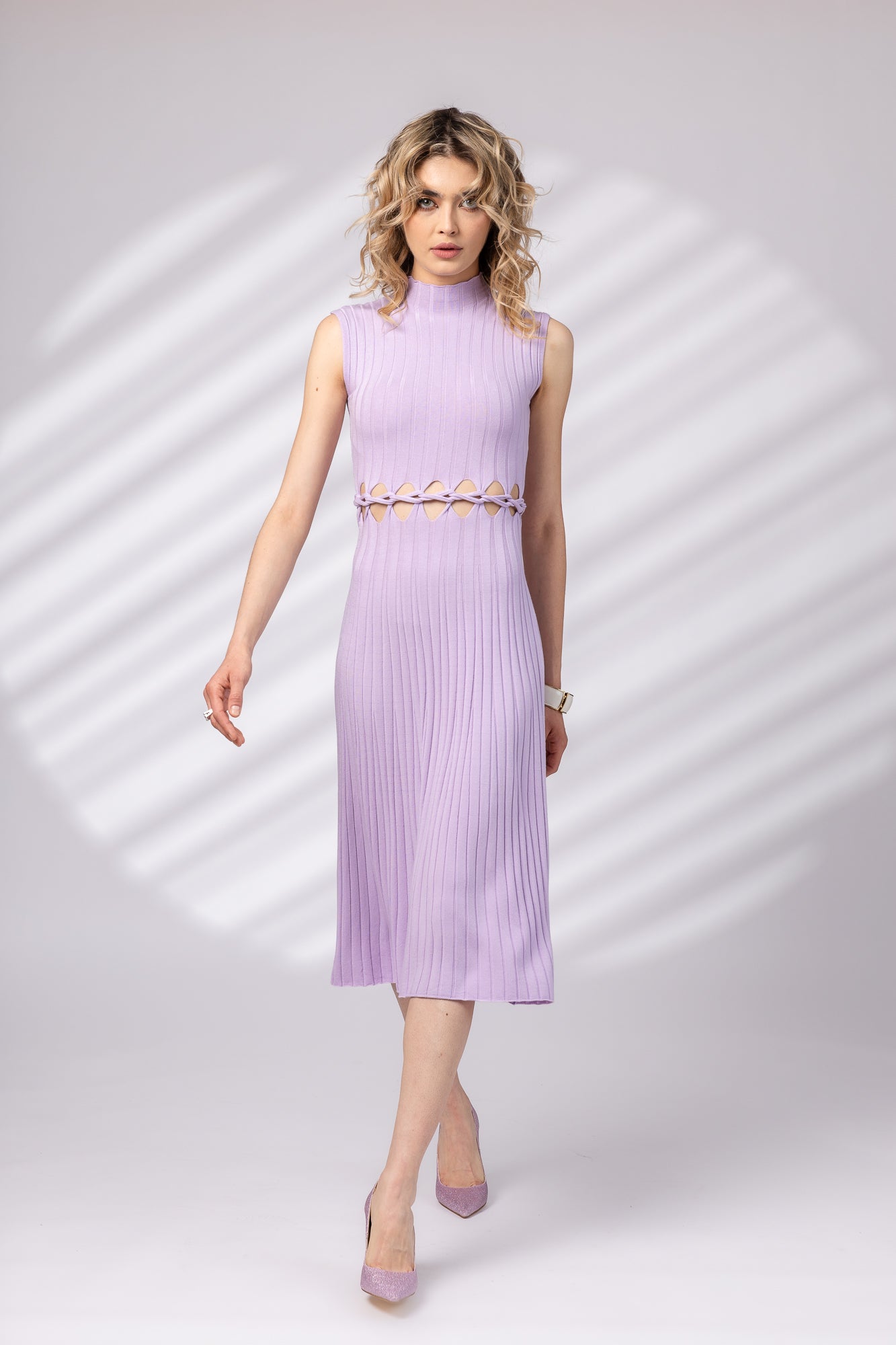 Dress with braid at the waist
