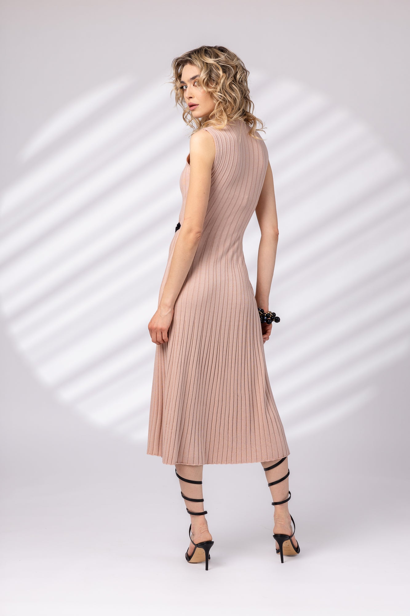 Dress with partial braid at the waist