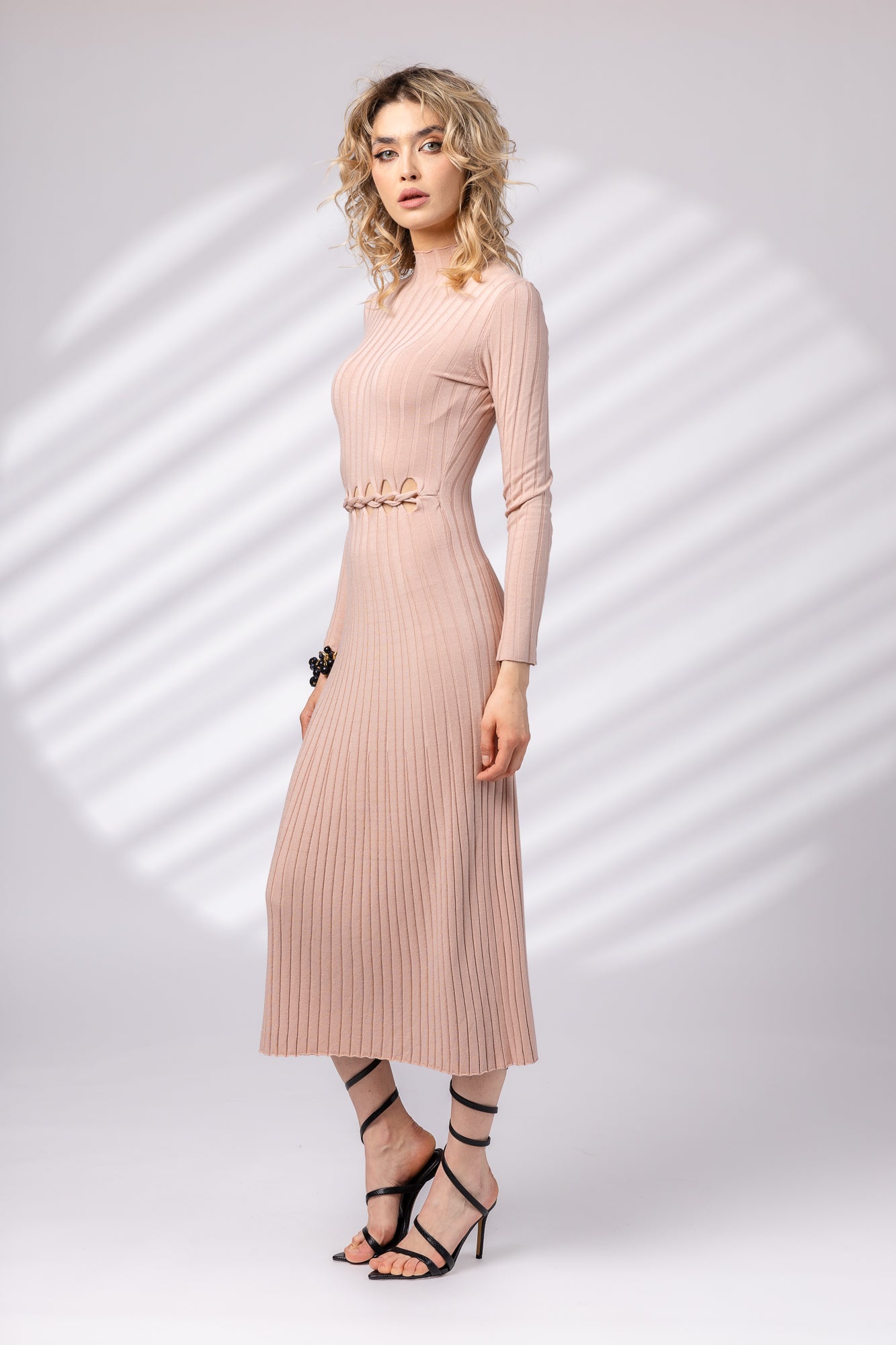 Dress with partial braid at the waist