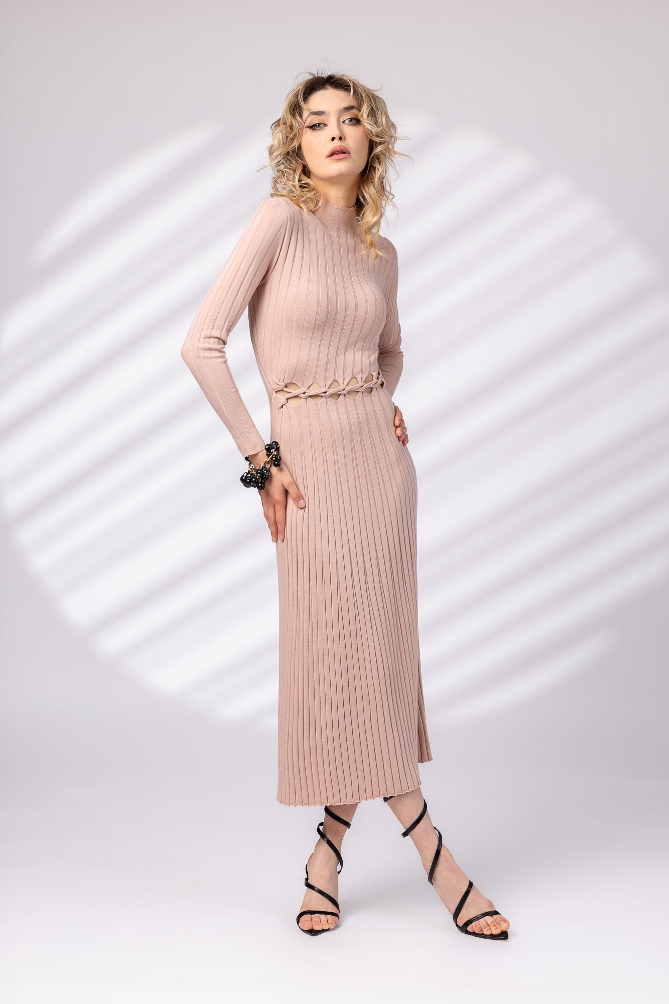 Dress with partial braid at the waist