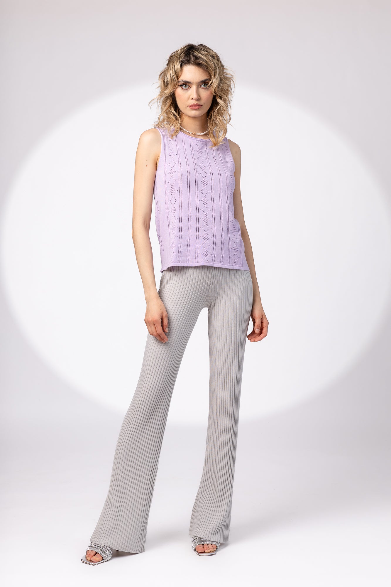 Openwork top with overlay at the back