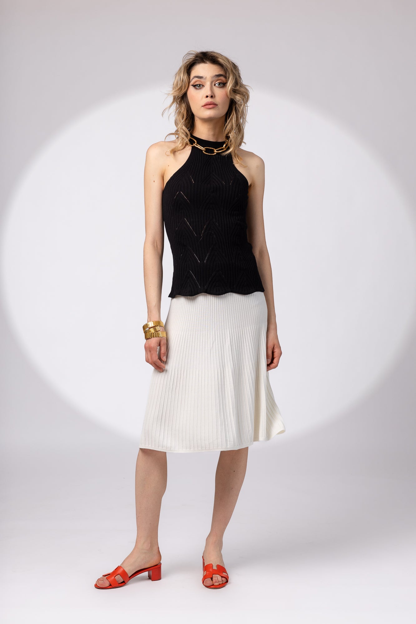 Openwork top with cutout at the back