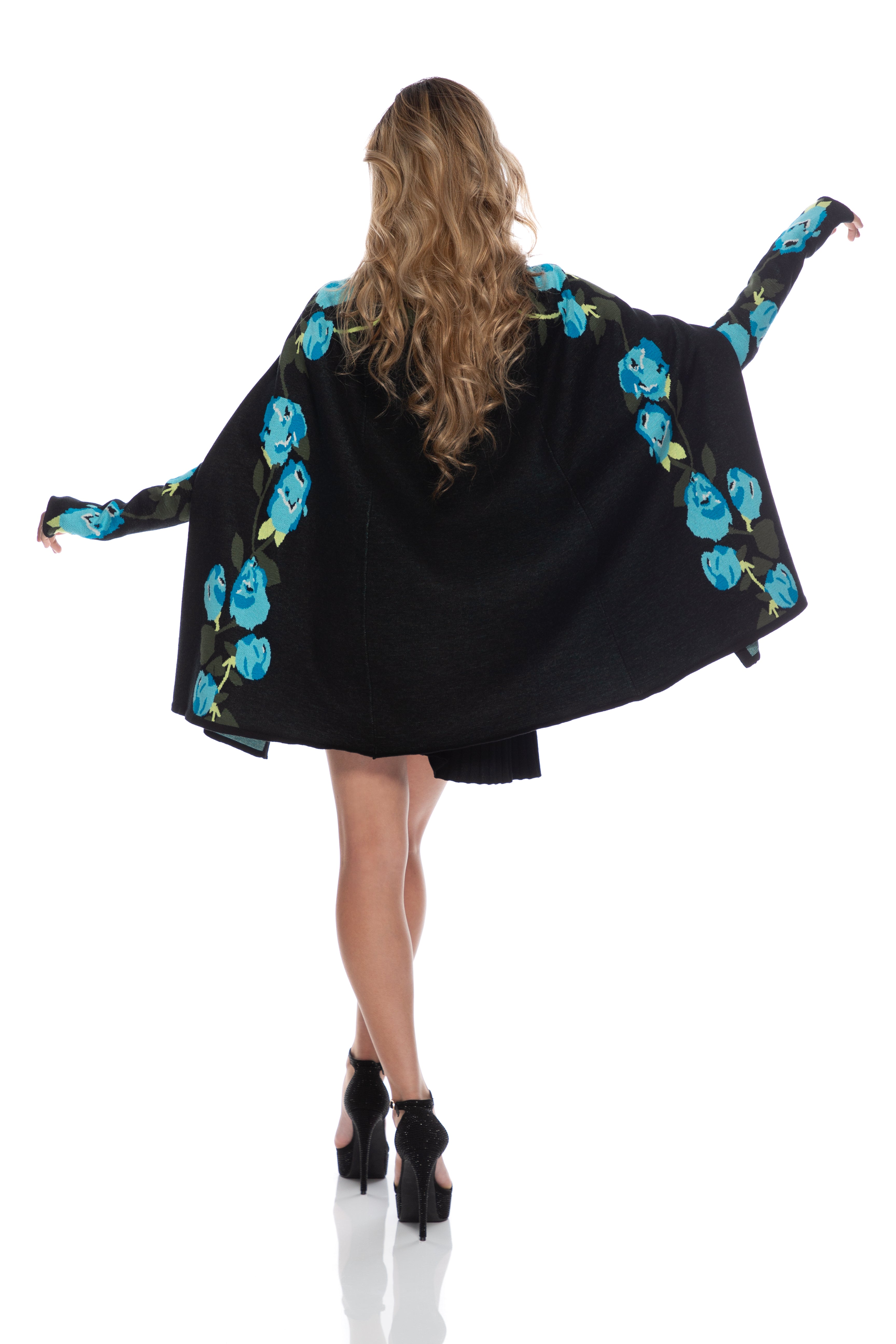 Long cape with "stylized roses" motifs