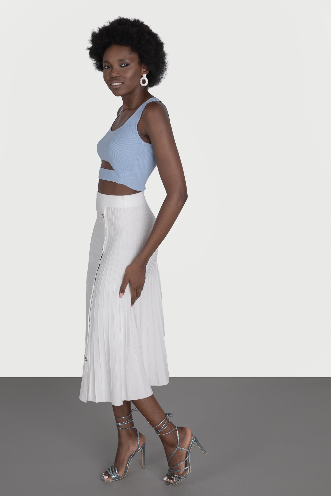 Flared skirt with slit and buttons
