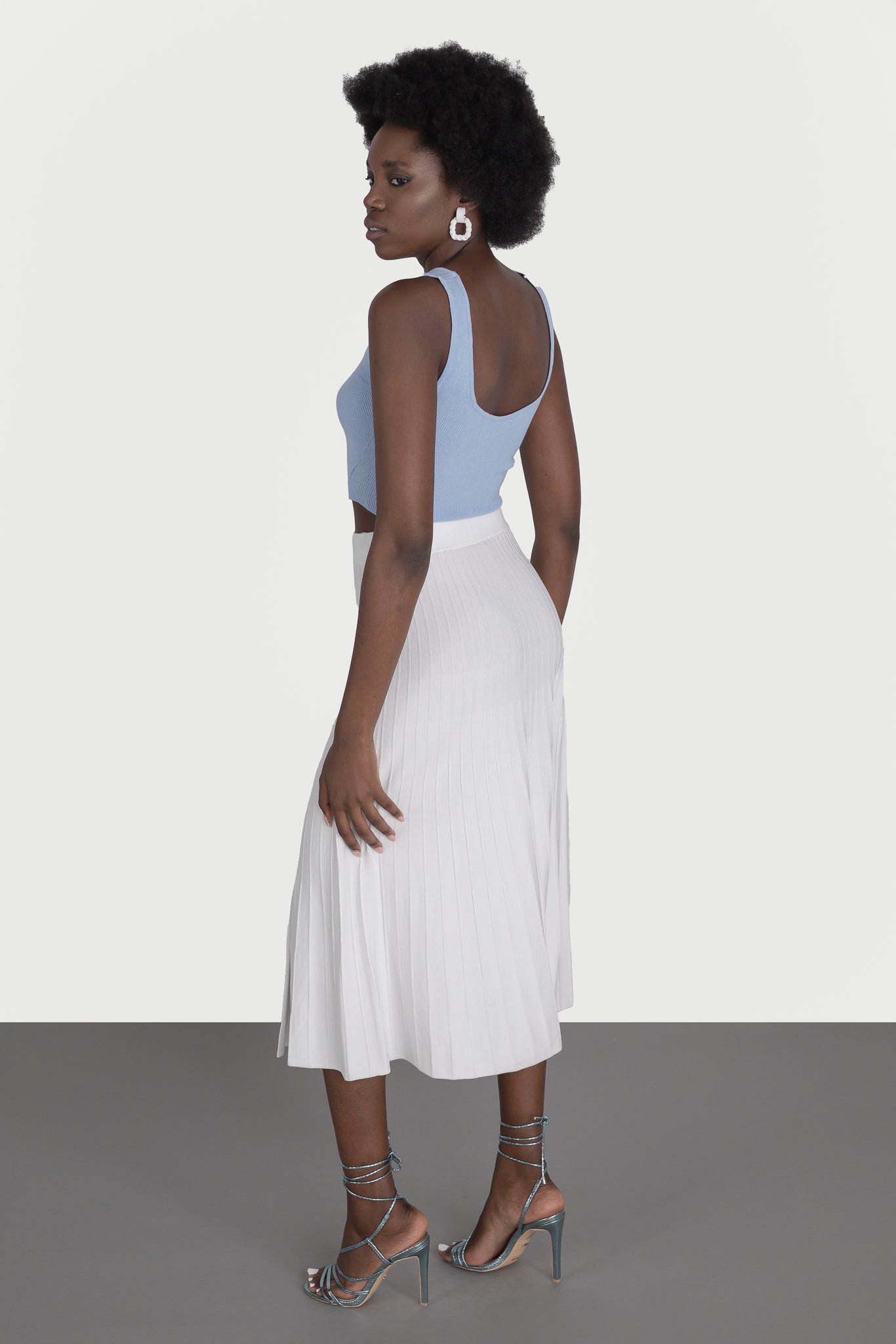 Flared skirt with slit and buttons