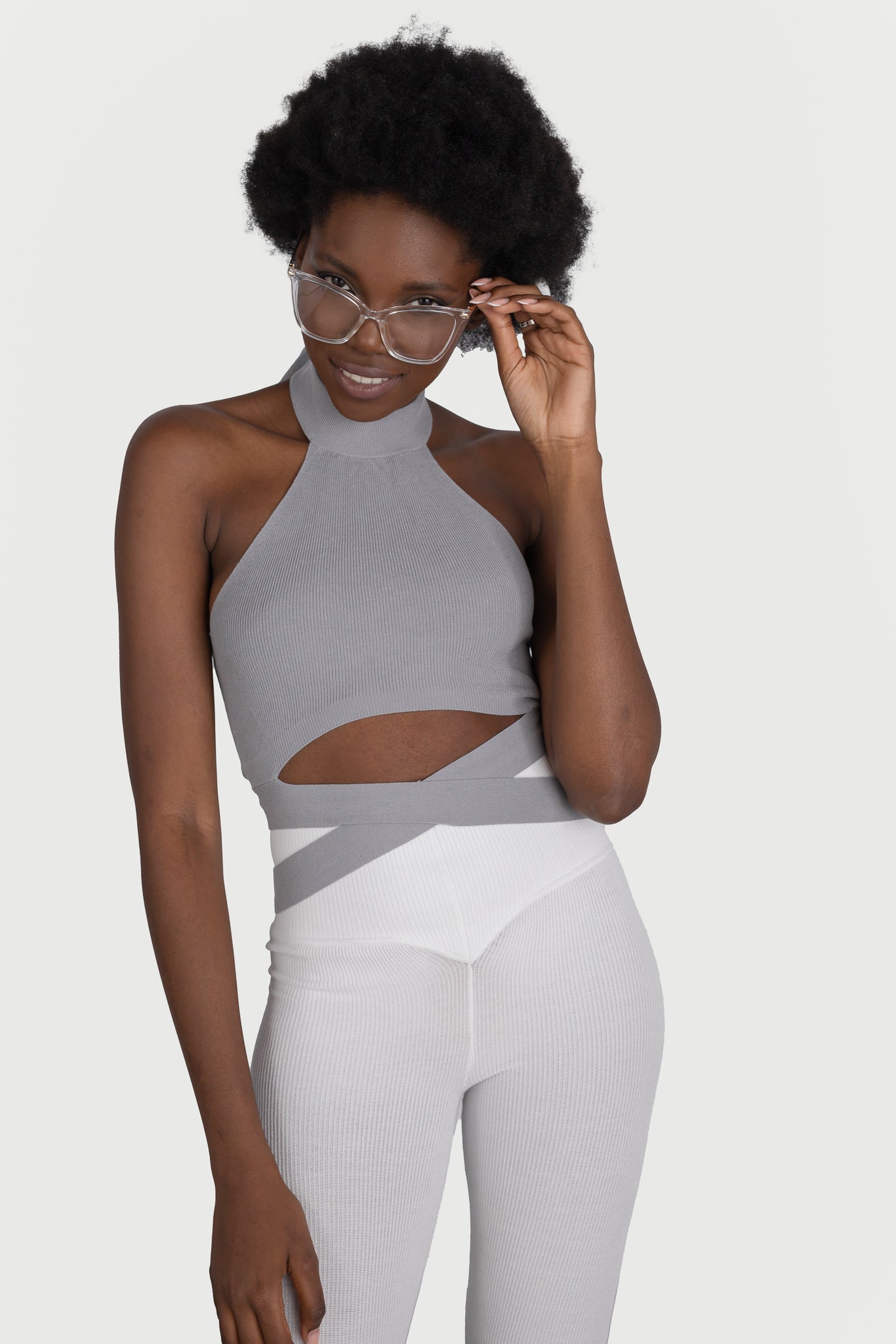 Short top with cords at the neck and waist