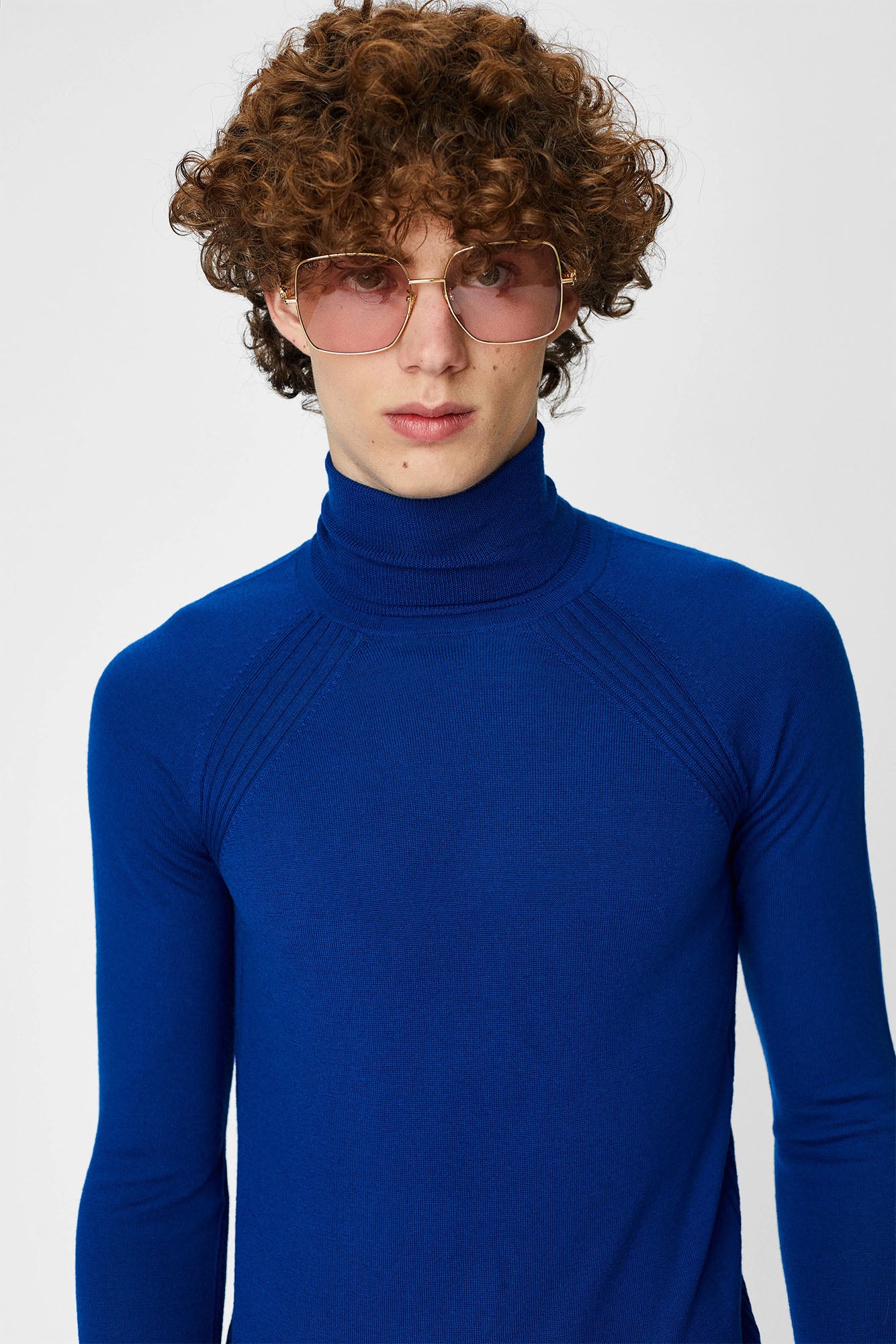 Sweater with roll collar and long sleeves